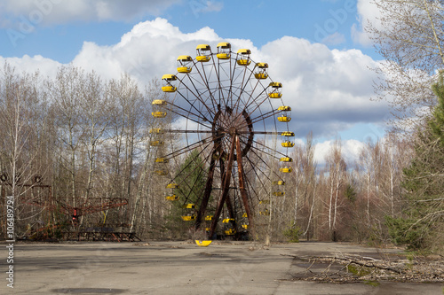 UKRAINE. Chernobyl Exclusion Zone. - 2016.03.19. Abandoned amusement park in the Pripyat city photo