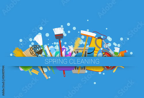 spring cleaning supplies blue background. tools of housecleaning