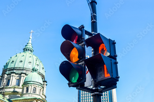 Orange color on the traffic light in Montreal downtown. photo