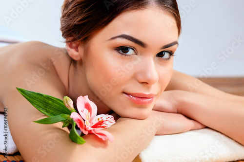 Beautiful young woman at a spa salon