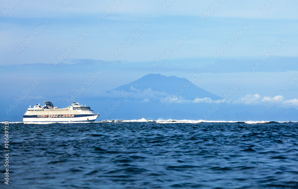 cruise ship in the sea with island