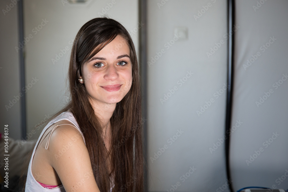 Image of a young woman with a lovely look and charming smile Image of a young woman with a lovely look and charming smile