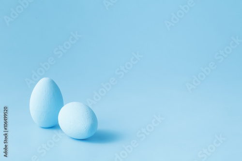 Colored easter eggs on blue background