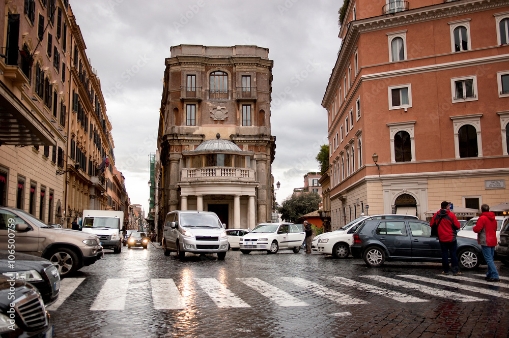 Cars driving on the street at Piazza della Trinità dei Monti, Rome, Italy