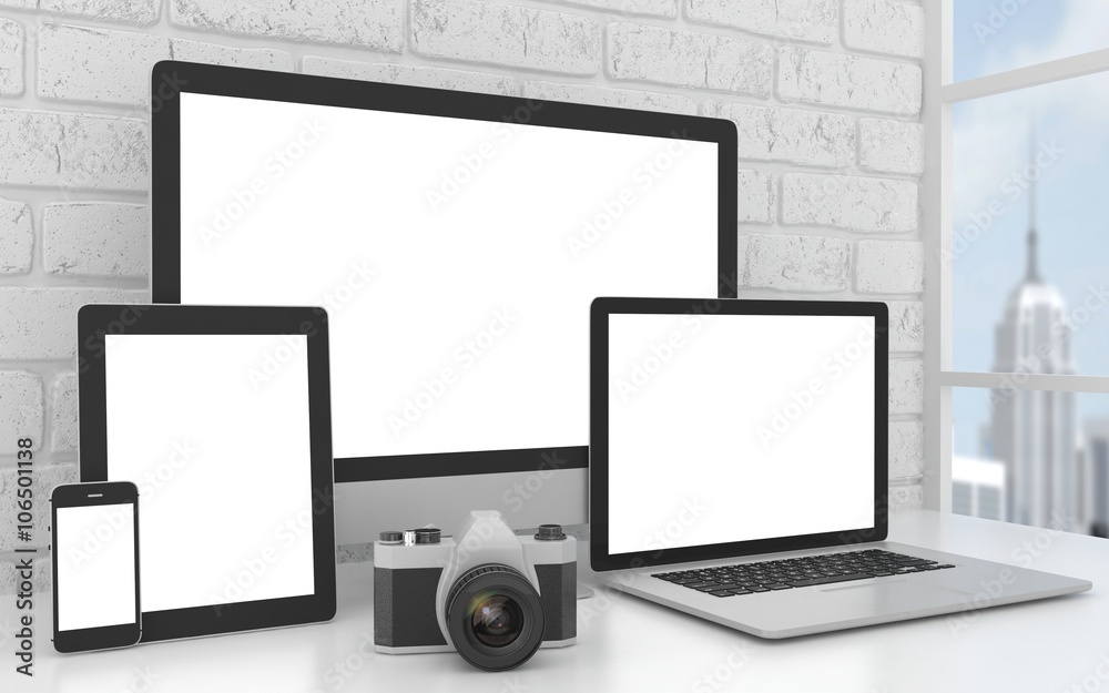 Responsive mockup screen. Monitor, laptop, tablet, phone on table in office. 3D rendering. Responsive mockup screen. Monitor, laptop, tablet, phone on table in office. 3D rendering.