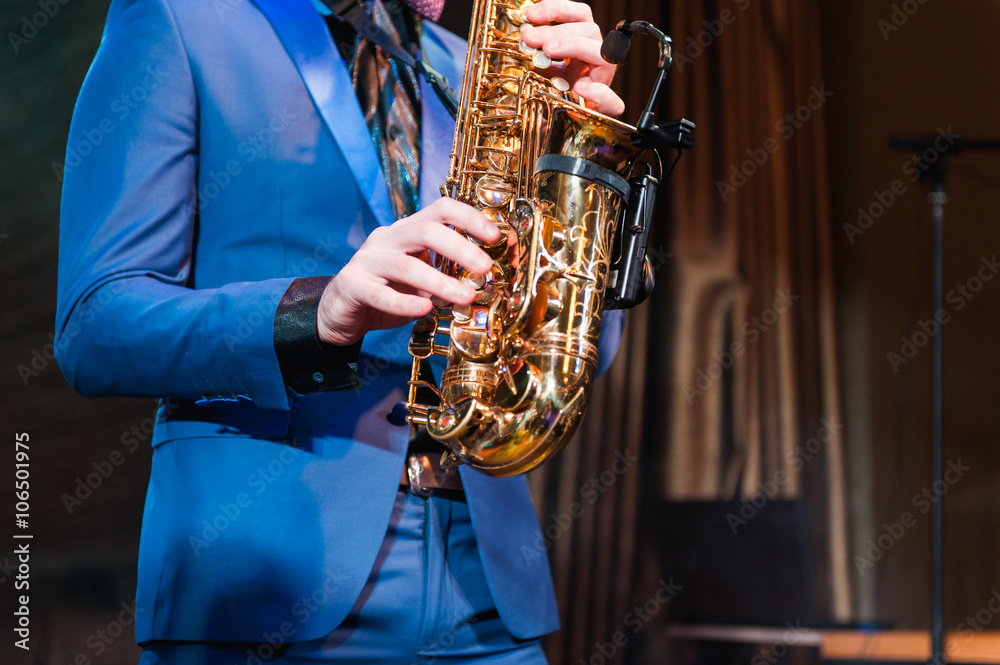 Fototapeta premium Saxophone player jazz music instrument Saxophonist