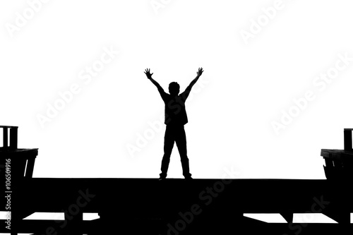 man raise his hand in black and white
