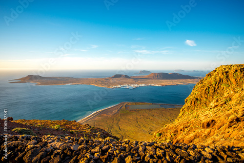 Top view on Graciosa island from El Rio viewpoint on Lanzarote island in Spain photo