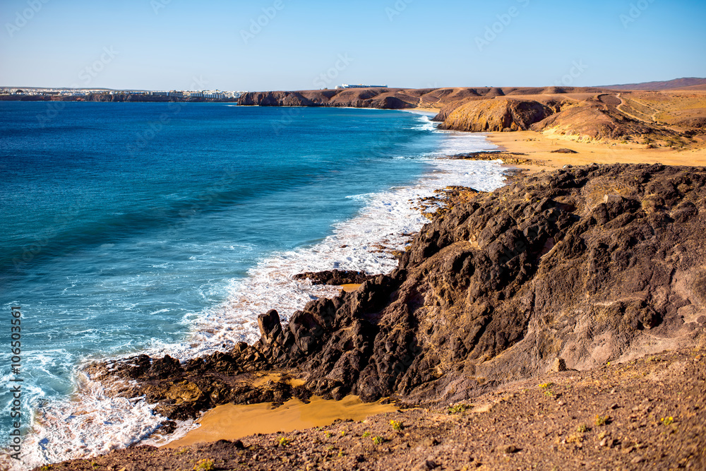 Papagayo beach near Las Coloradas resort on the south of Lanzarote island in Spain