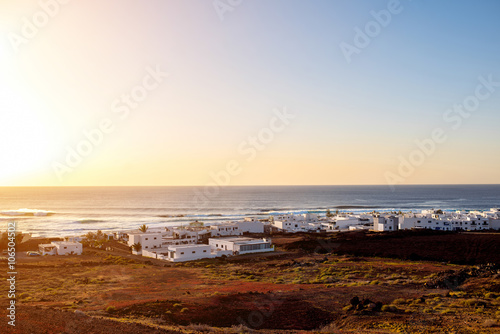 Cityscape view on El Golfo village with white houses on Lanzarote island in Spain
