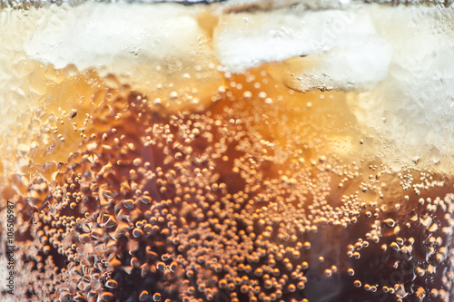 cola with ice cubes