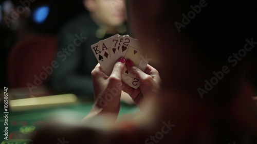 People playing poker in casino