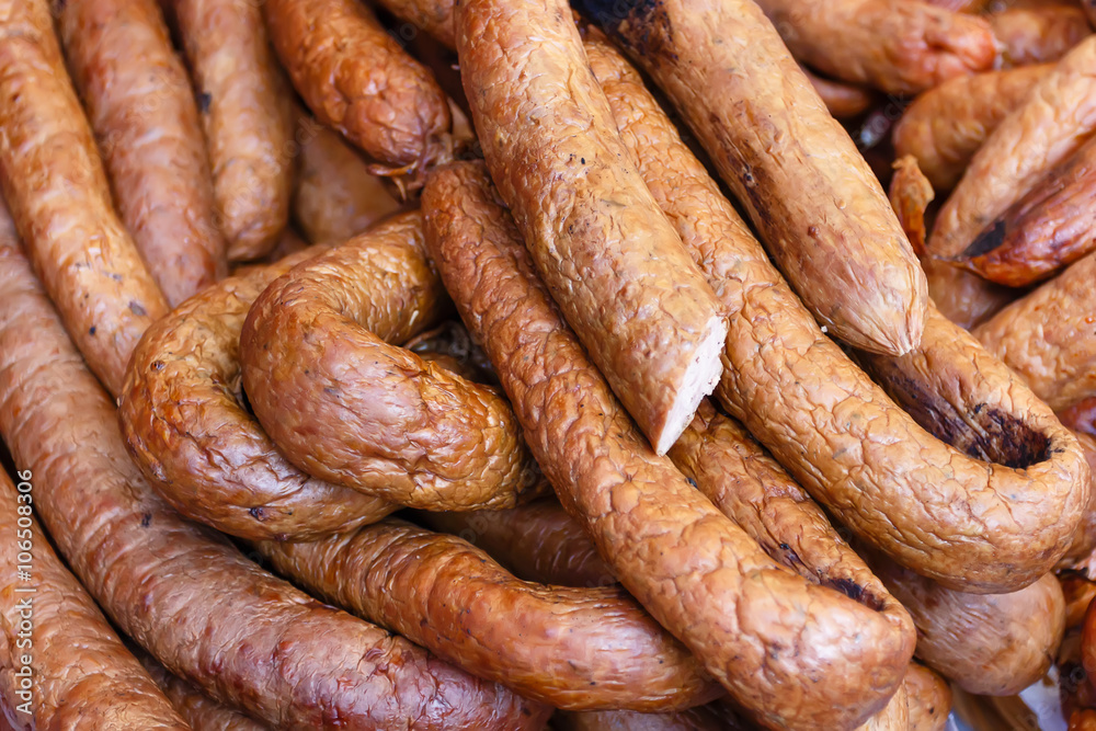 Homemade fresh meat delicacies (sausages) at a farmers' Sunday market. Homemade fresh meat delicacies (sausages) at a farmers' Sunday market.