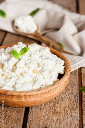 cottage cheese in a wooden bowl