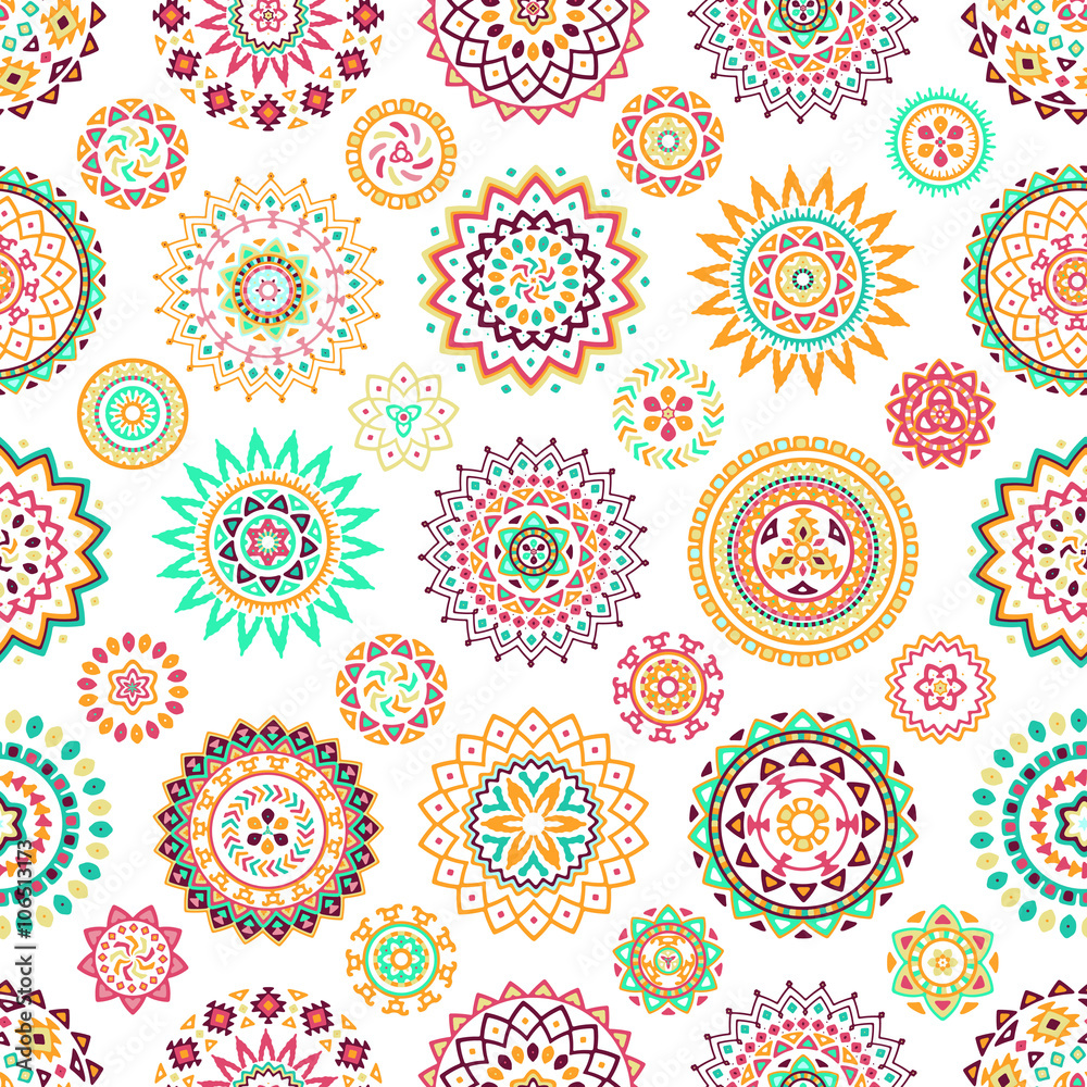 Seamless pattern of bright colorful geometric round ethnic decorative elements. Vector mandala background with bohemian, Oriental, Indian, Arabic, Aztec motifs.