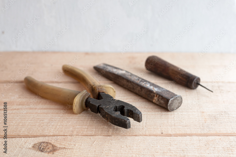 old tools on a wooden table

