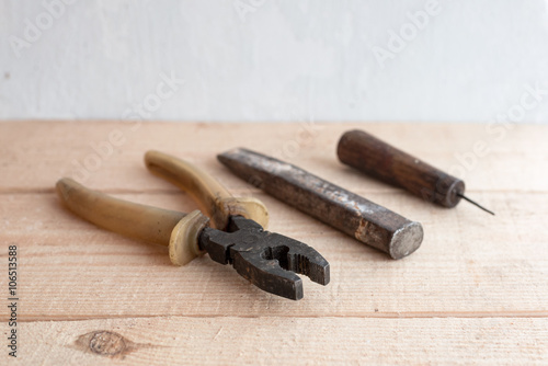 old tools on a wooden table 