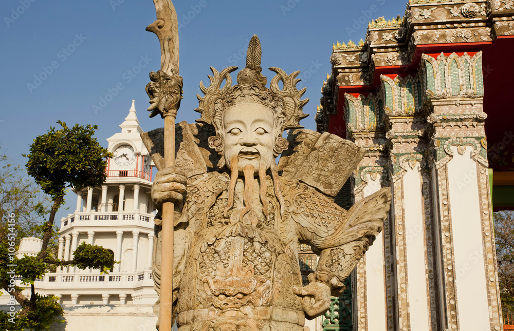 Face of the temple guards at entrance of historical monastery in Bangkok