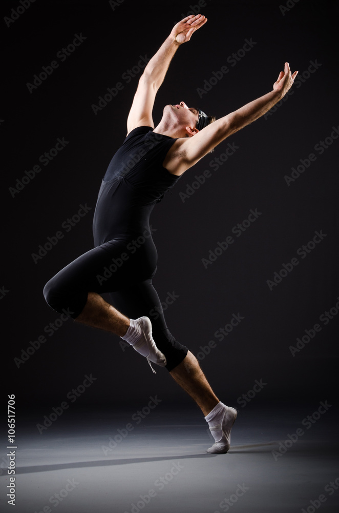 Young man training for ballet dances