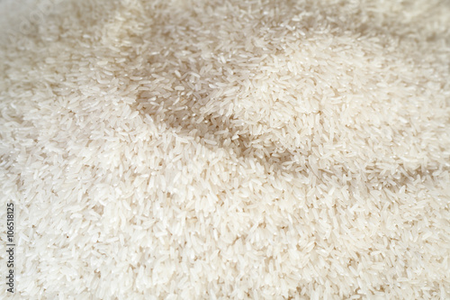Rice background. Uncooked raw cereals. Macro.