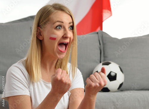 Obraz na płótnie Polish fan cheers football team in the national colors. w salonie