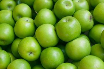 Green apple background.