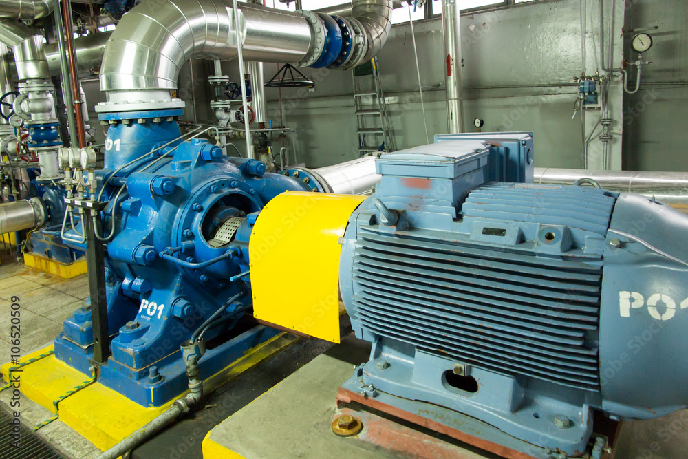 several water pumps with large motors several water pumps with large motors