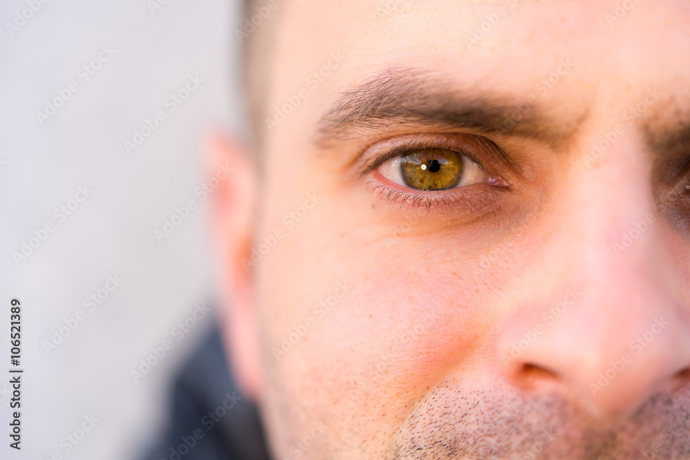 Man's eye looking at camera Man's eye looking at camera