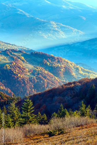 Sunbeam and autumn misty mountain.