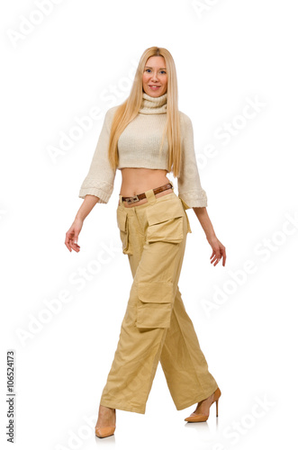 Pretty woman in beige trousers isolated on white