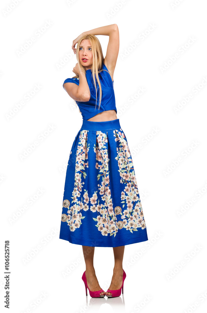 Woman in long blue folral dress isolated on white