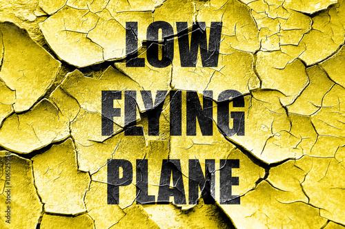 Grunge cracked Low flying planes sign