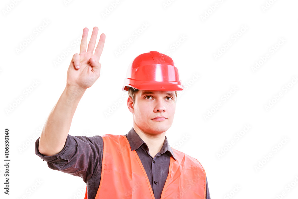 Man worker showing three fingers. Man worker showing three fingers.