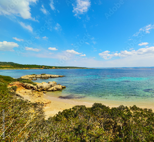 small cove under a blear sky in Sardinia