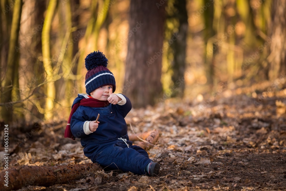 Caucasian boy playing outdoor at springtime Caucasian boy playing outdoor at springtime