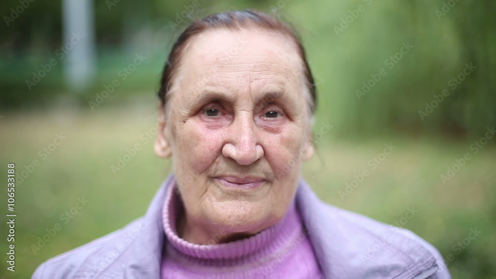Portrait of hispanic senior woman at green nature background. Sad face Portrait of hispanic senior woman at green nature background. Sad face