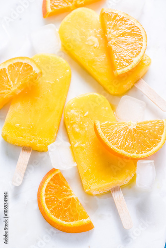 Homemade, natural orange ,refreshing summer popsicle