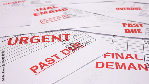 Credit crunch debt and recession. Tracking over past due and overdue invoices and bills for urgent payment. Debts final demands and threats of legal action.