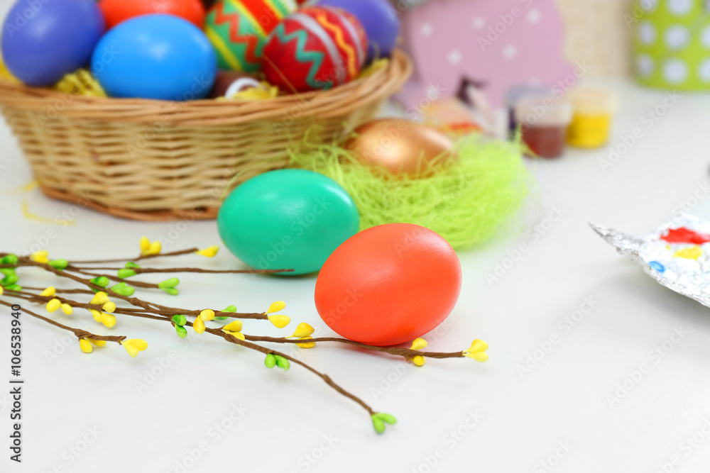 Colorful Easter eggs on white table closeup Colorful Easter eggs on white table closeup