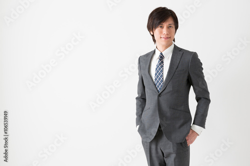 portrait of asian businessman on white background