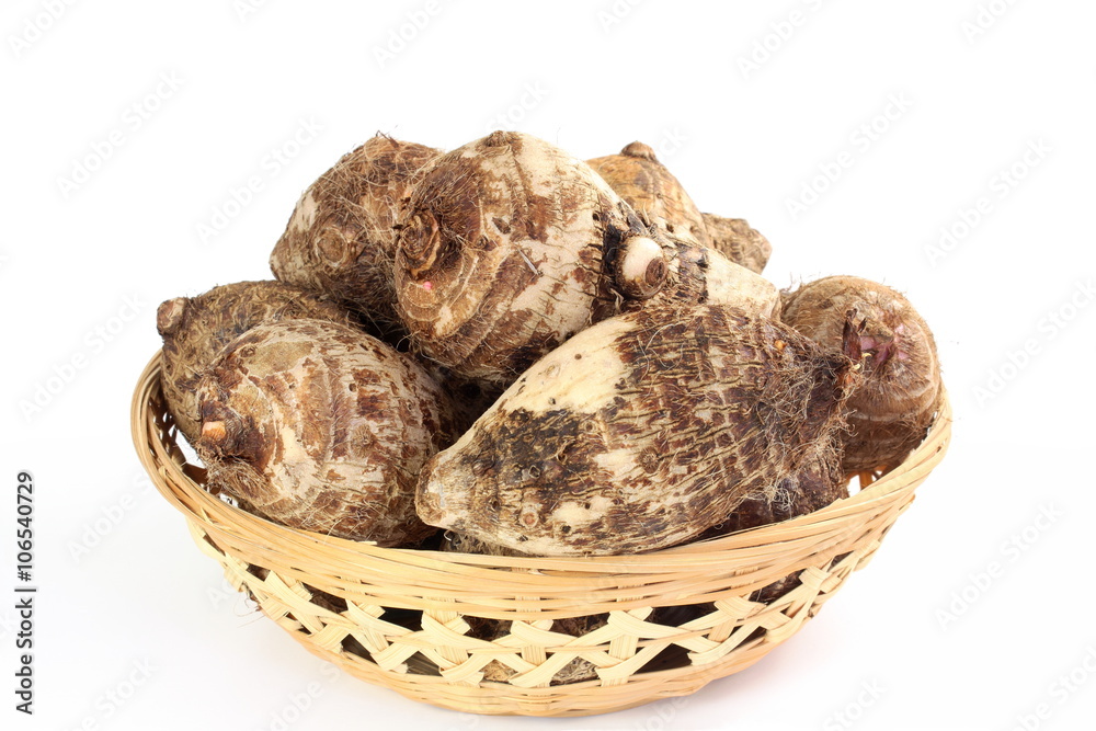 Taro root or eddoes root isolated on white background Taro root or eddoes root isolated on white background