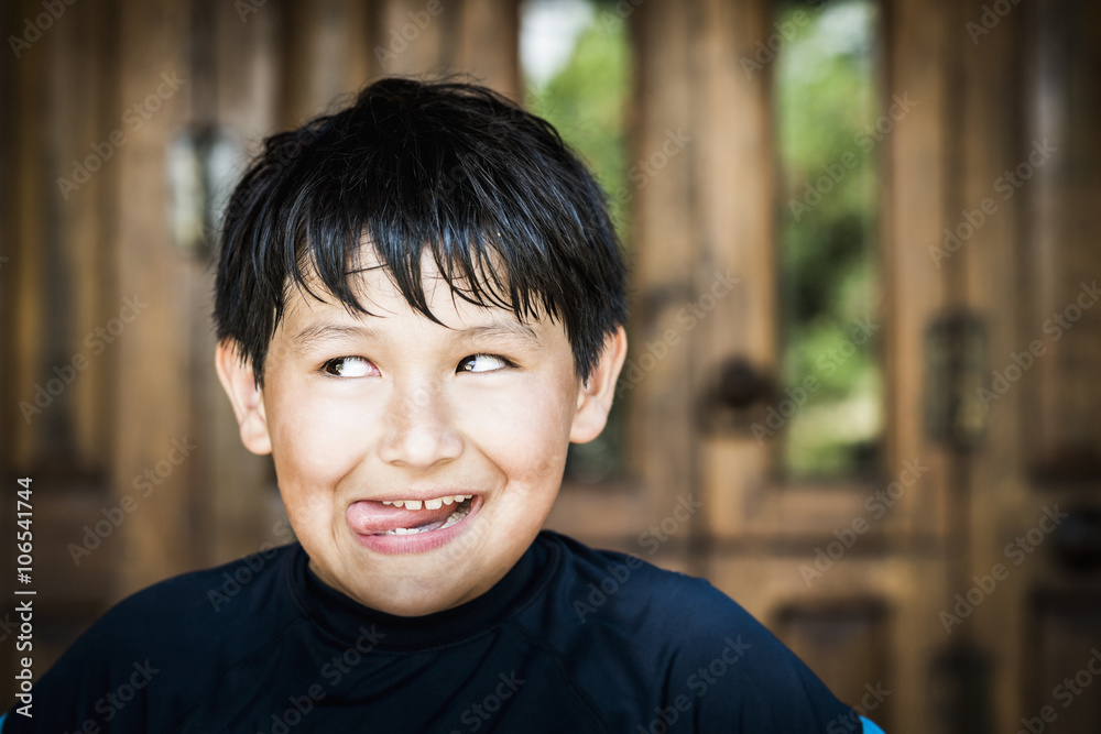 Hispanic boy making face Hispanic boy making face