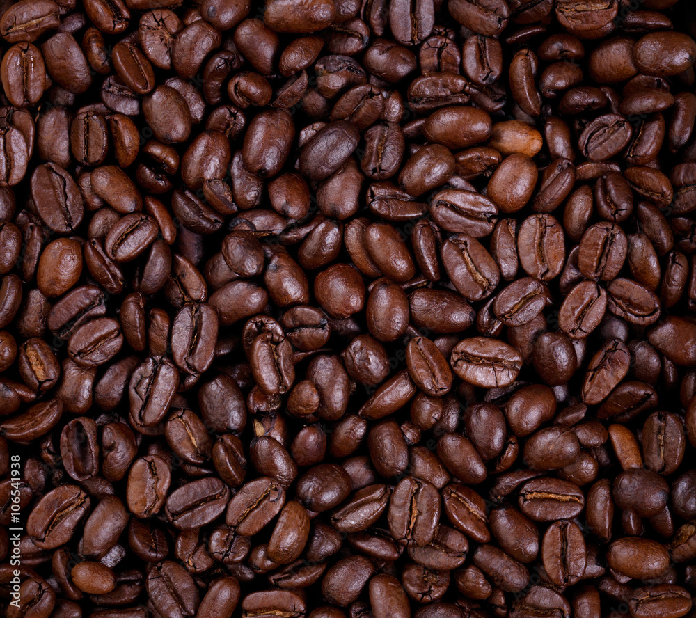 Freshly roasted coffee beans in filled frame layout Freshly roasted coffee beans in filled frame layout