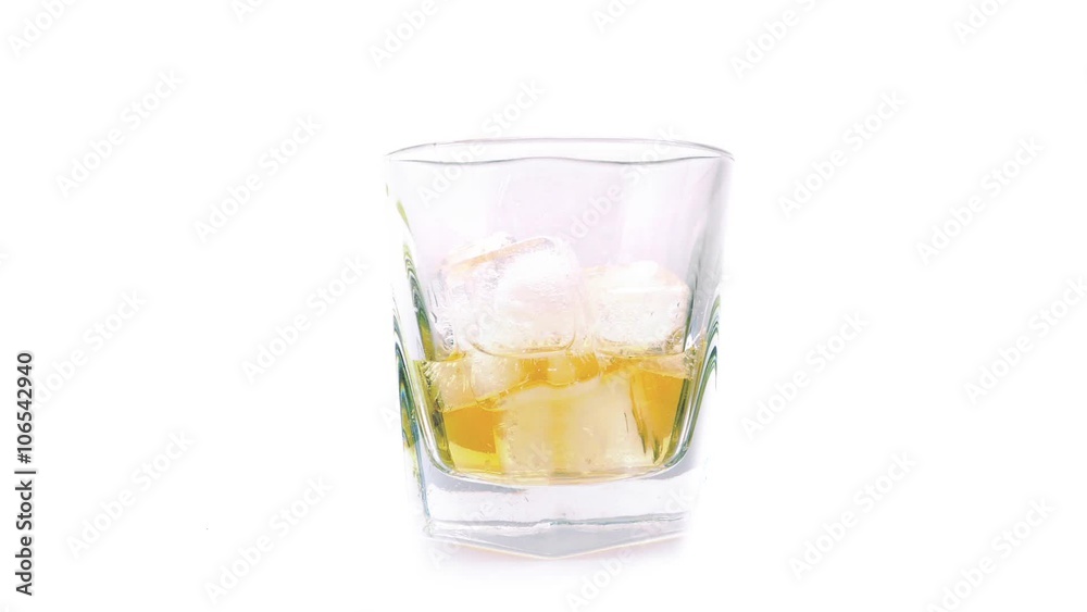 Whiskey Poured Into Rotating Glass Whiskey Poured Into Rotating Glass