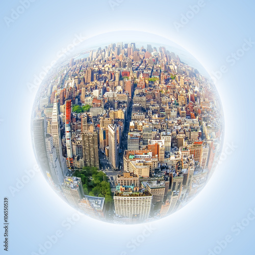 Conceptual image with fisheye effect and globe effect. Representative image of the heart of Manhattan and business finance. Aerial view of skyscrapers and busy streets of New York city  USA.