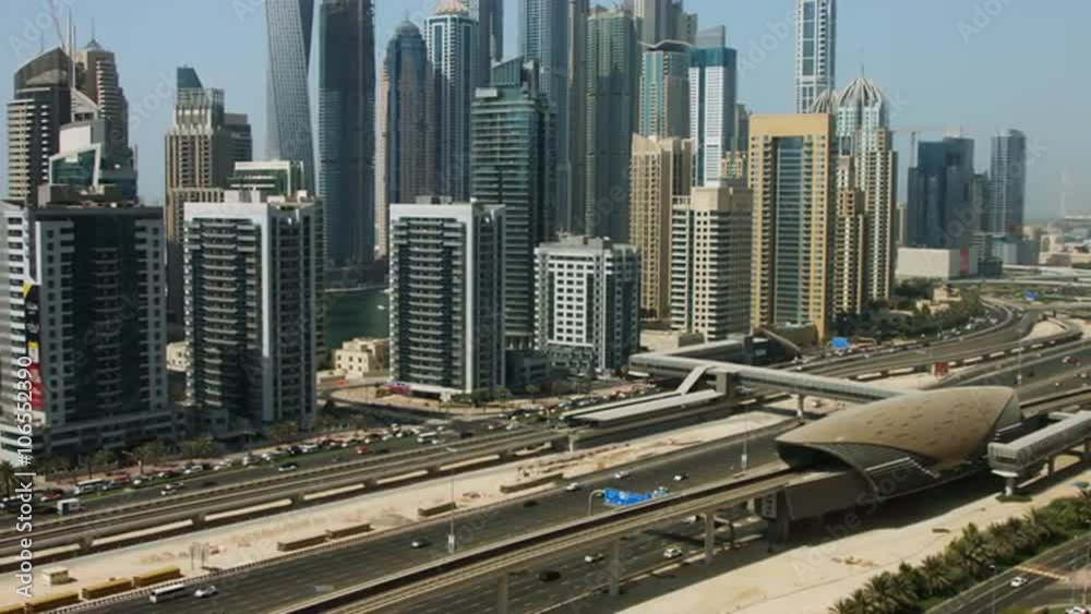 Pan shot of towers in a city, Dubai, United Arab Emirates Pan shot of towers in a city, Dubai, United Arab Emirates