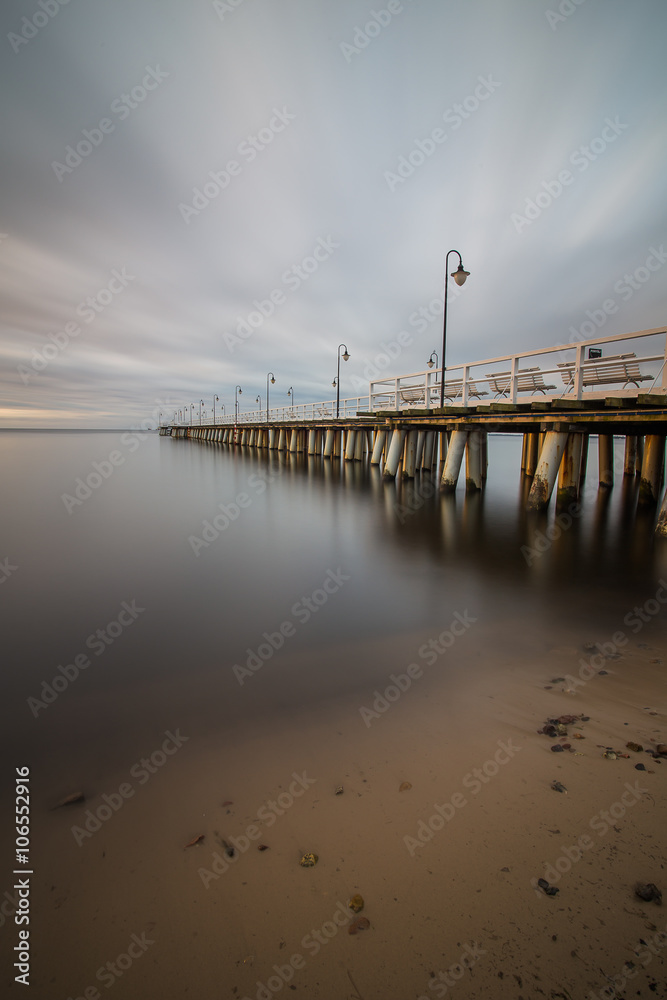 Gdynia Orlowo pier. Vintage photo of Baltic sea shore seascape.