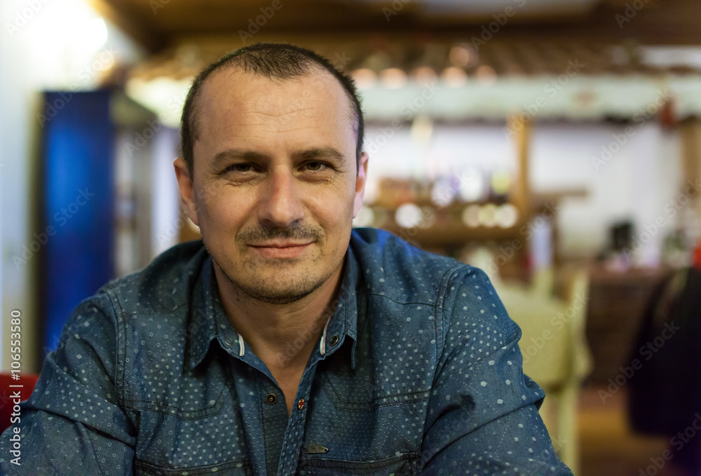 Man waiting at the table in the restaurant Man waiting at the table in the restaurant