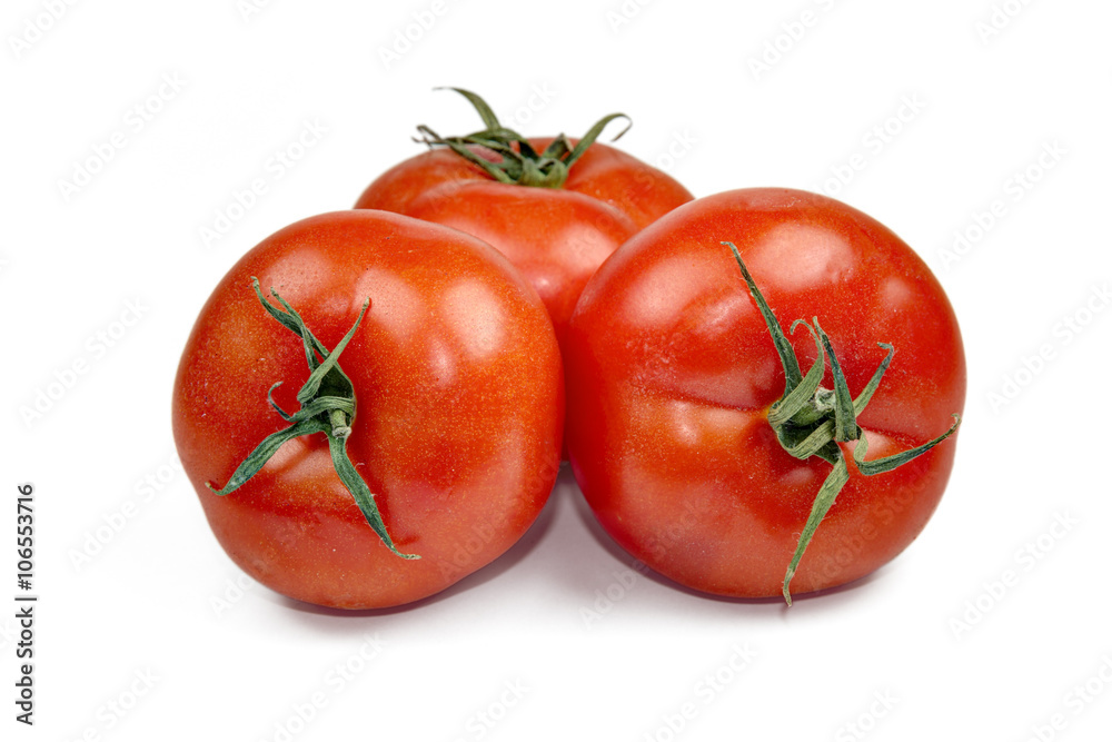 Red fresh tomatoes isolated on white background Red fresh tomatoes isolated on white background