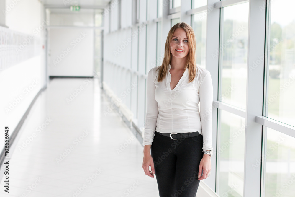 Businesswoman standing in a modern Building Businesswoman standing in a modern Building